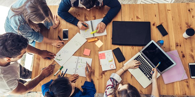 People works as a team. Photo.